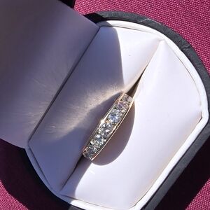 14k Yellow Gold Channel Set Band.